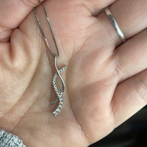 Like new 1/2 carat total weight Diamond necklace 10k white gold